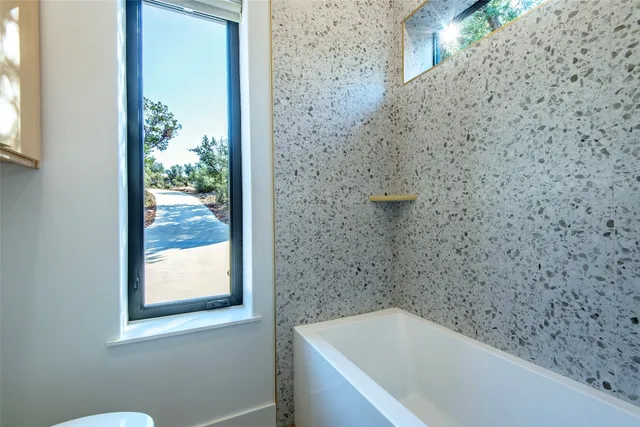 a bathroom with a bathtub