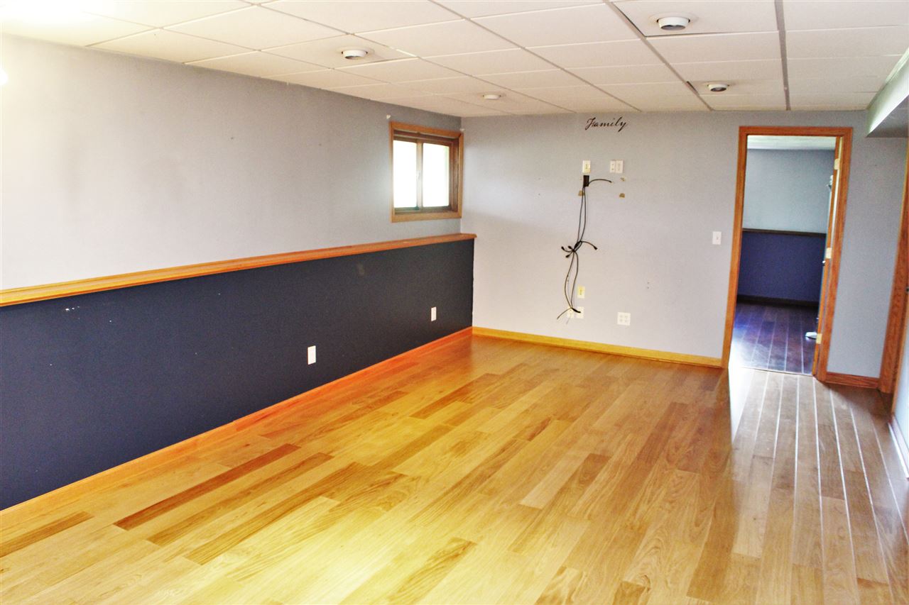 308 Pembroke Road Southwest Poplar Grove, IL 61065 - Photo 19 of 25 a view of a room with wooden floor