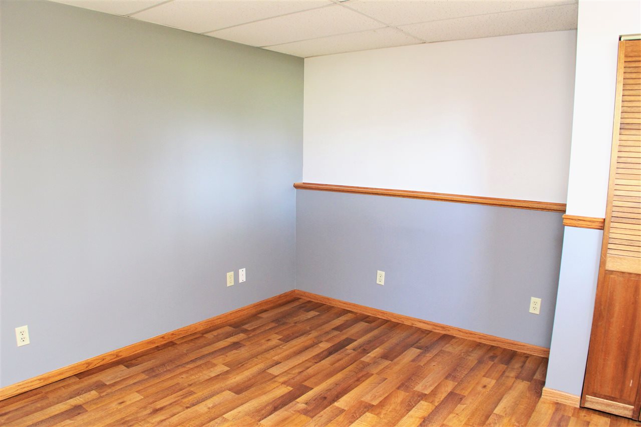 308 Pembroke Road Southwest Poplar Grove, IL 61065 - Photo 23 of 25 a view of empty room with wooden floor