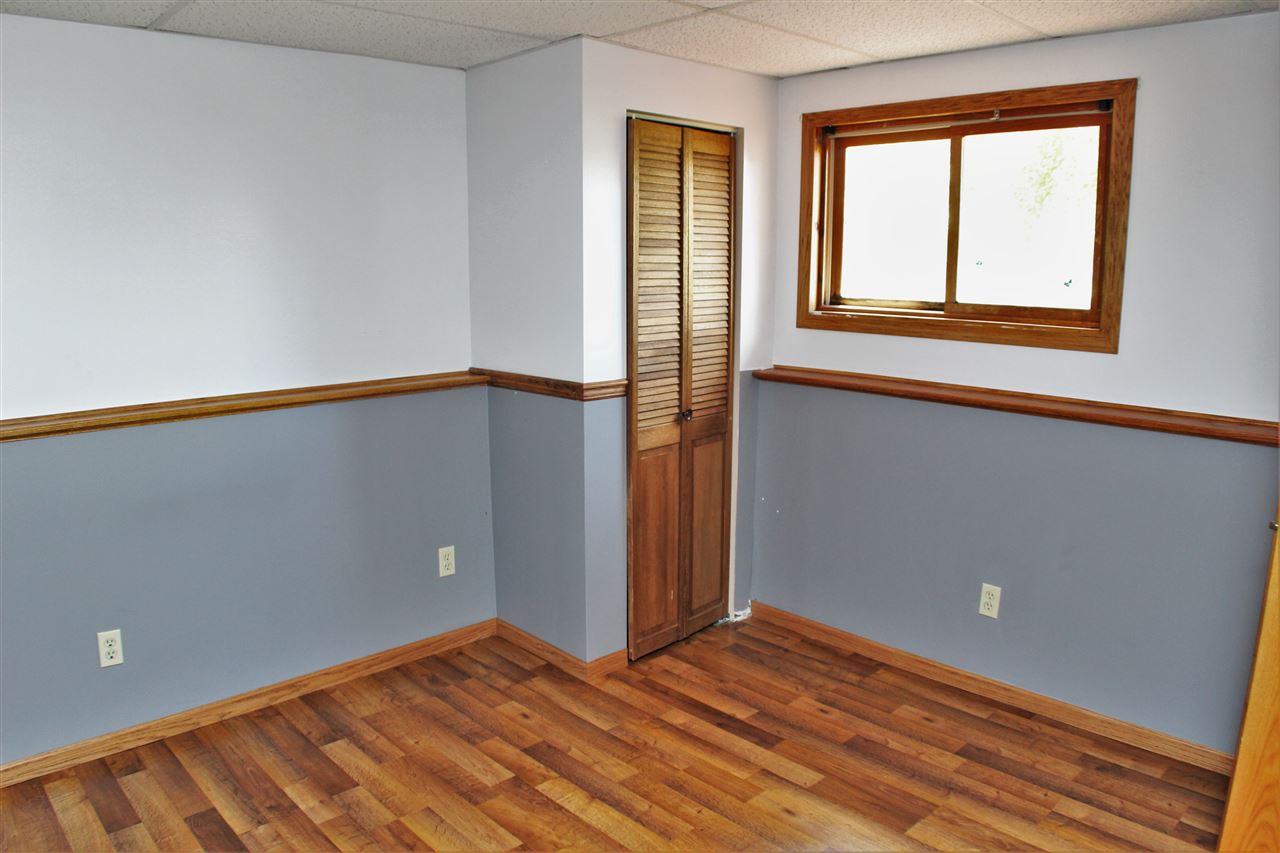 308 Pembroke Road Southwest Poplar Grove, IL 61065 - Photo 24 of 25 a view of an empty room with a window