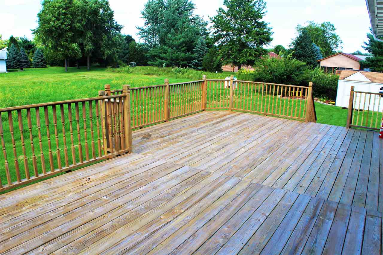 308 Pembroke Road Southwest Poplar Grove, IL 61065 - Photo 25 of 25 a view of a deck with a yard