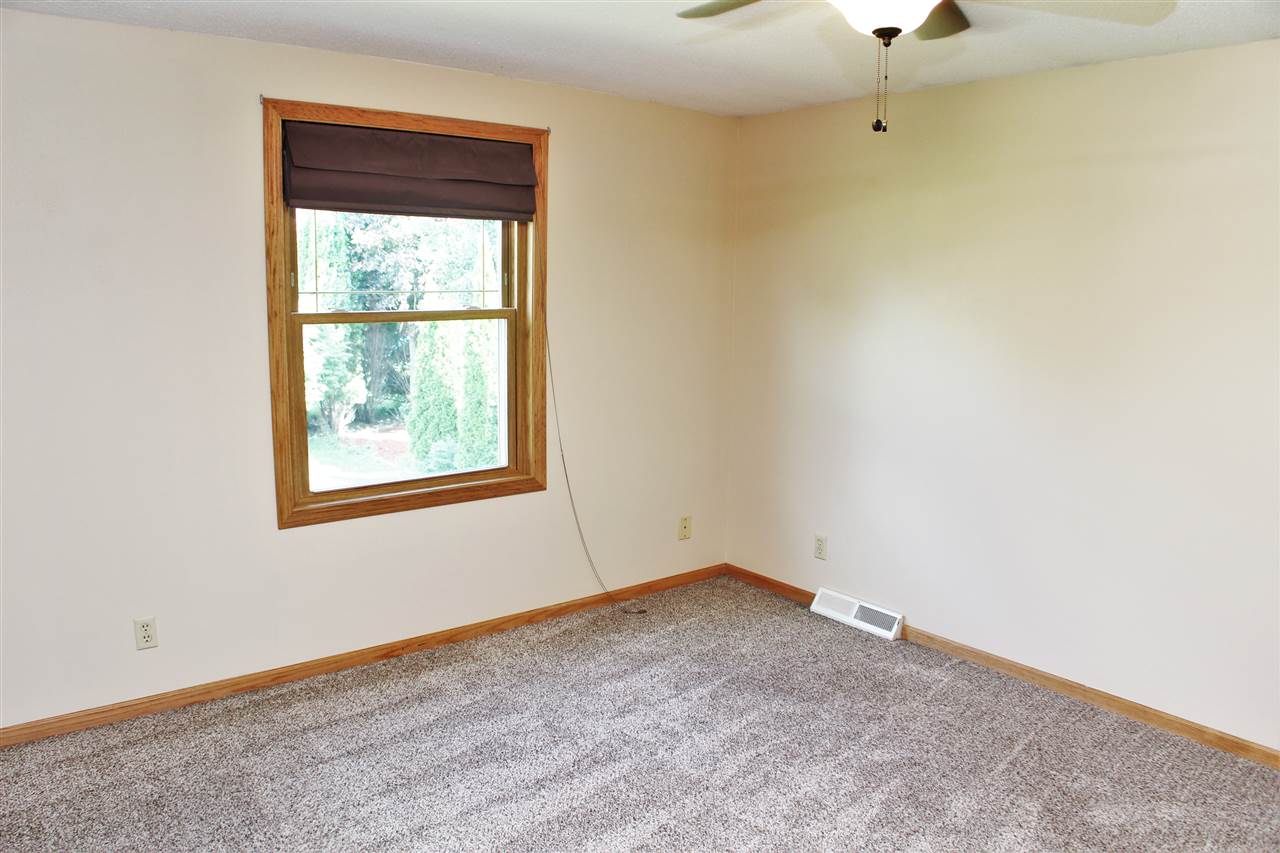 308 Pembroke Road Southwest Poplar Grove, IL 61065 - Photo 9 of 25 an empty room with a window
