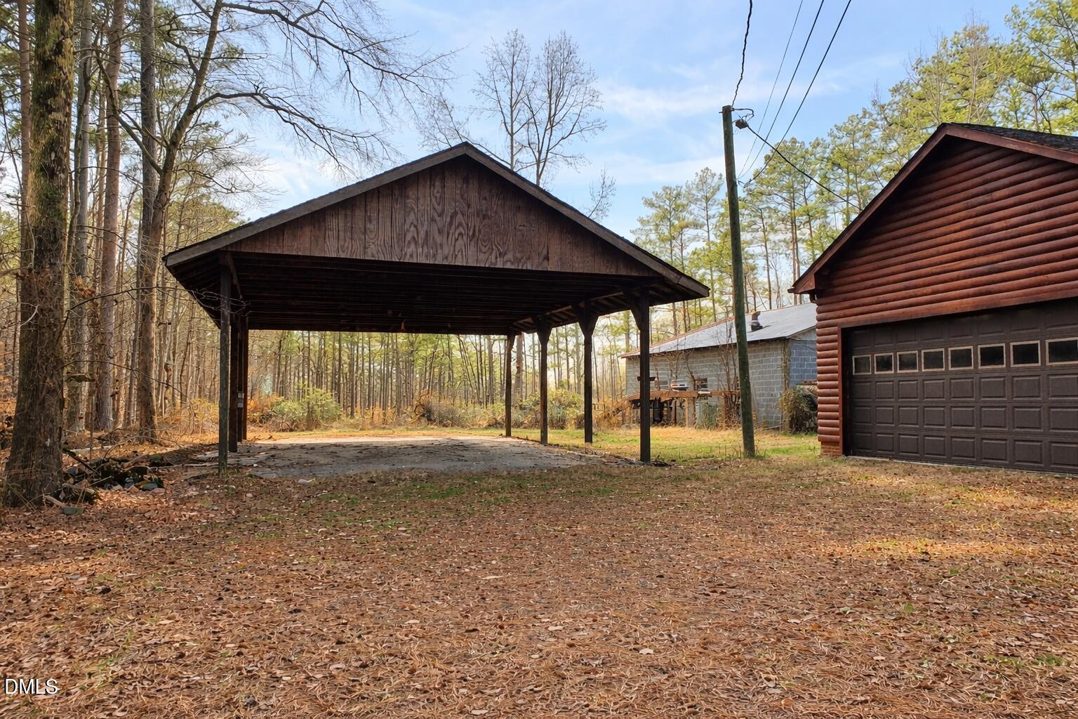 715 Patterson Road Durham, NC 27704 - Photo 13 of 18 a blue house with a yard