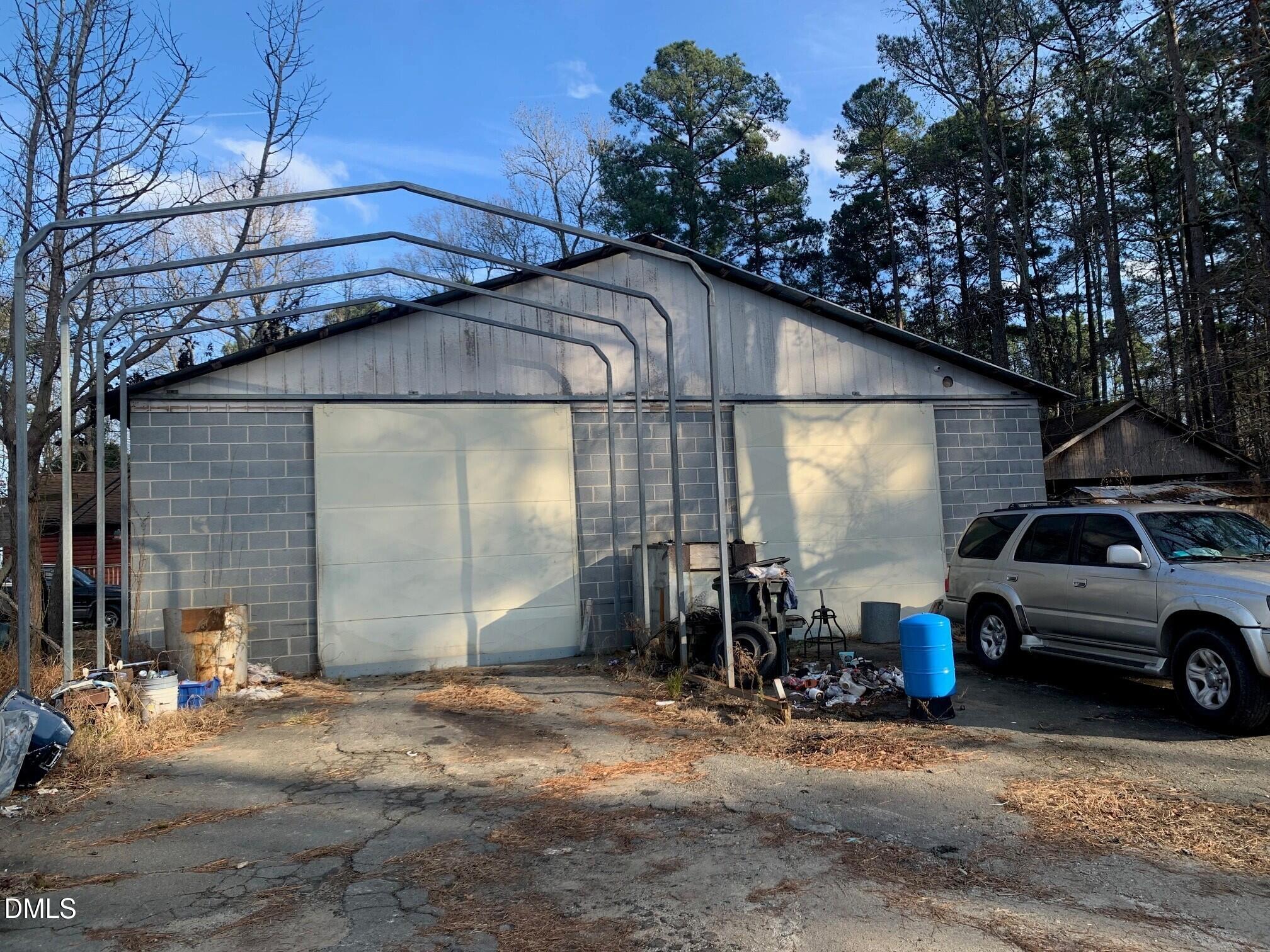 715 Patterson Road Durham, NC 27704 - Photo 14 of 18 a view of a car park in front of house