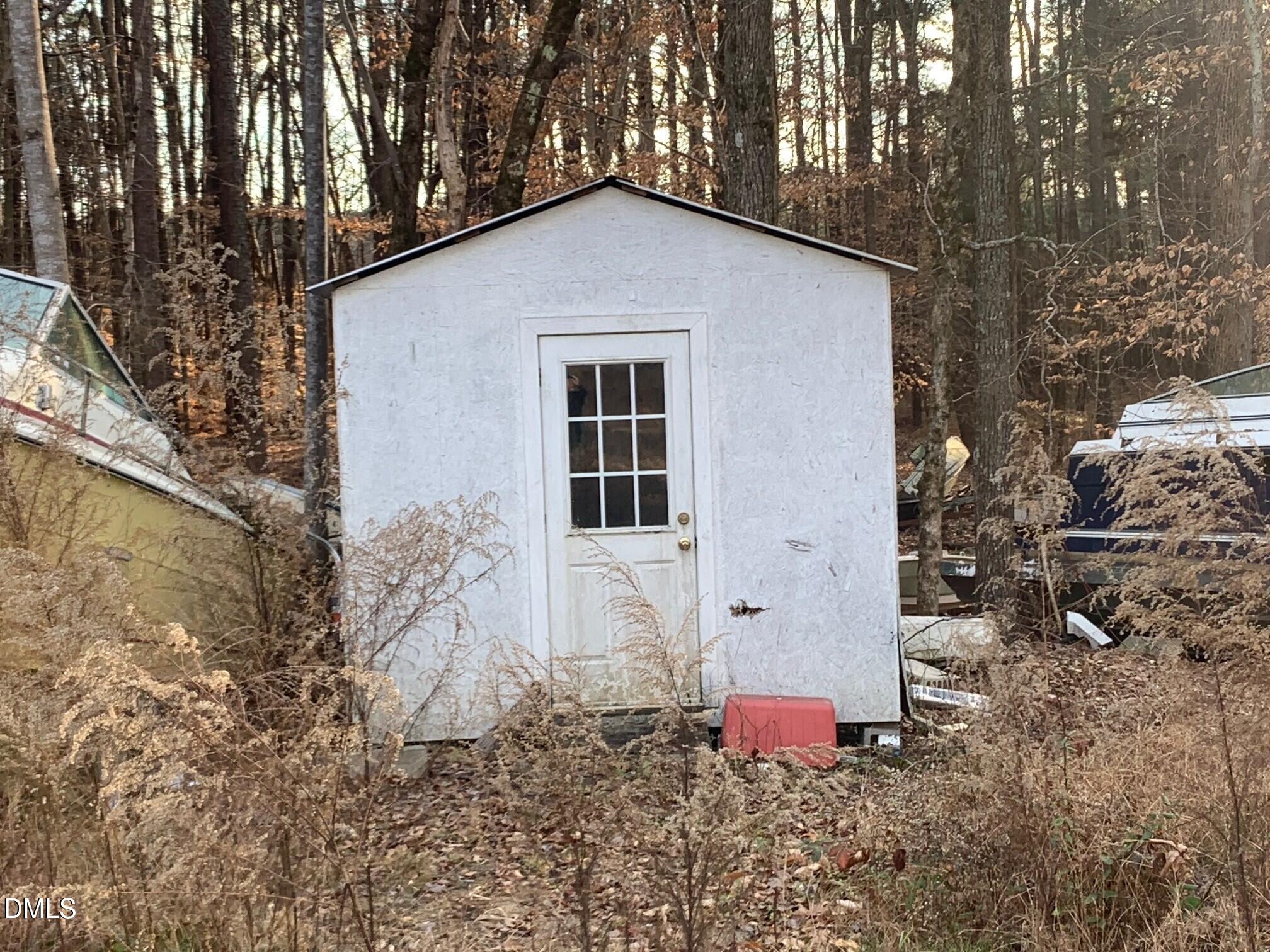 715 Patterson Road Durham, NC 27704 - Photo 17 of 18 a front view of a house with garden
