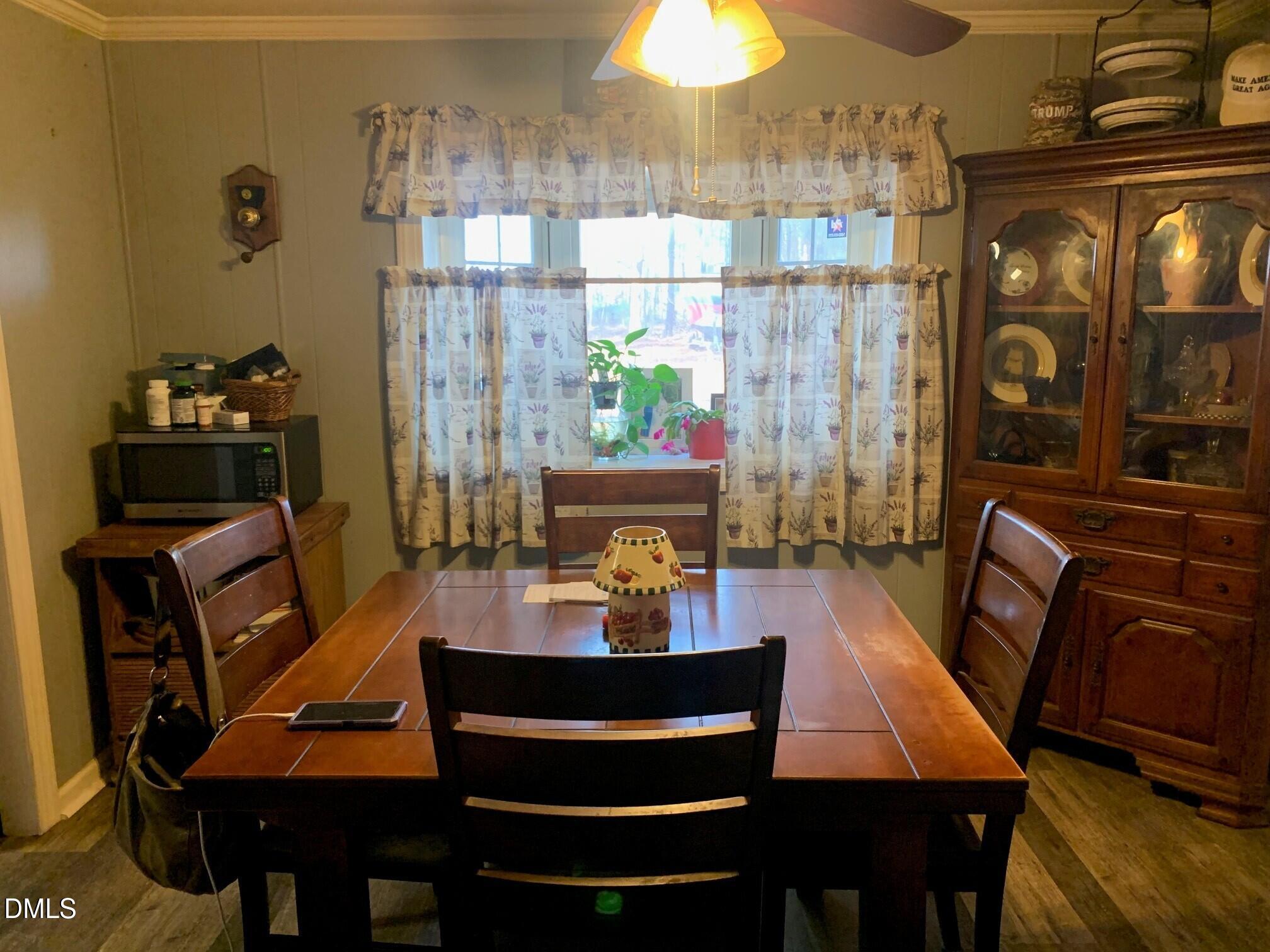 715 Patterson Road Durham, NC 27704 - Photo 3 of 18 a view of a dining room with furniture