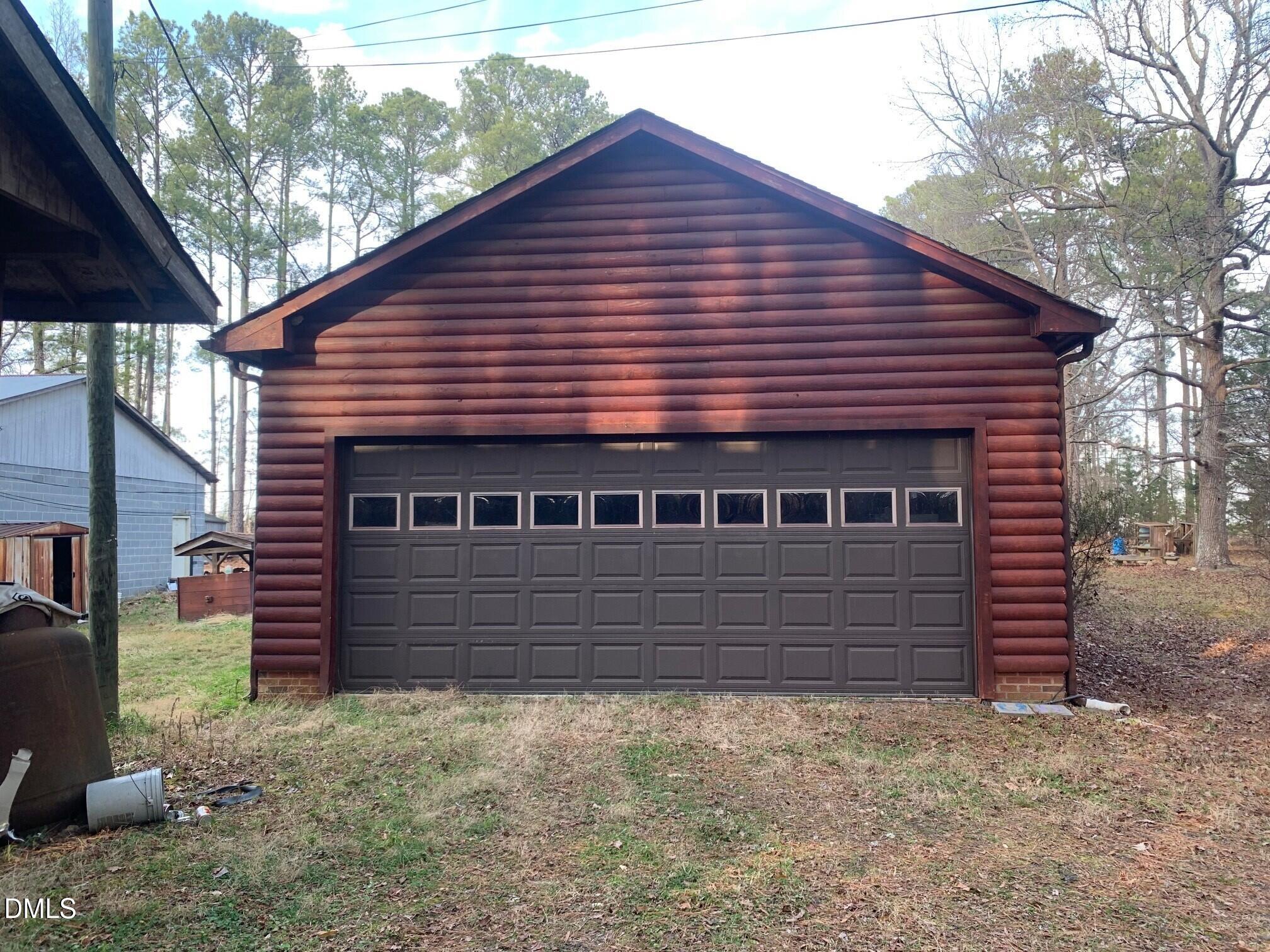 715 Patterson Road Durham, NC 27704 - Photo 8 of 18 a front view of a house with a yard