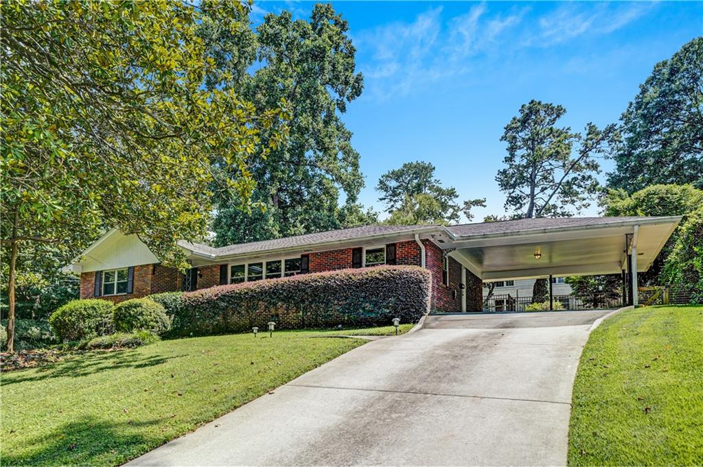 a view of house with outdoor entertaining spaces