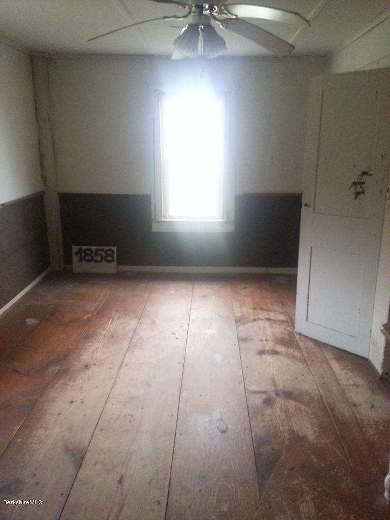 78 Church Road Florida, MA 01343 - Photo 8 of 15 a view of an empty room and window