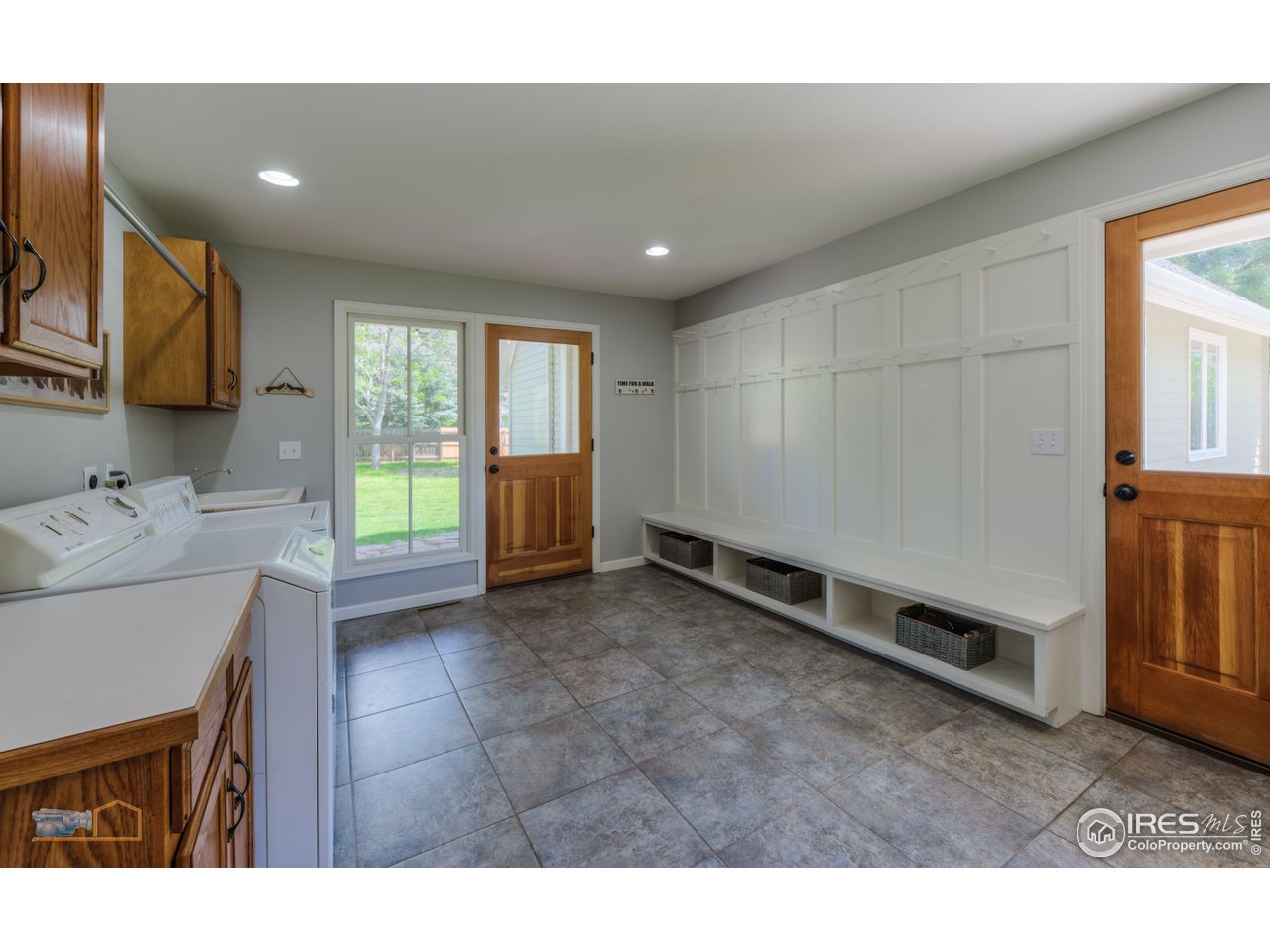 1799 Oak Avenue Boulder, CO 80304 - Photo 24 of 38 a living room with a sink furniture and a window