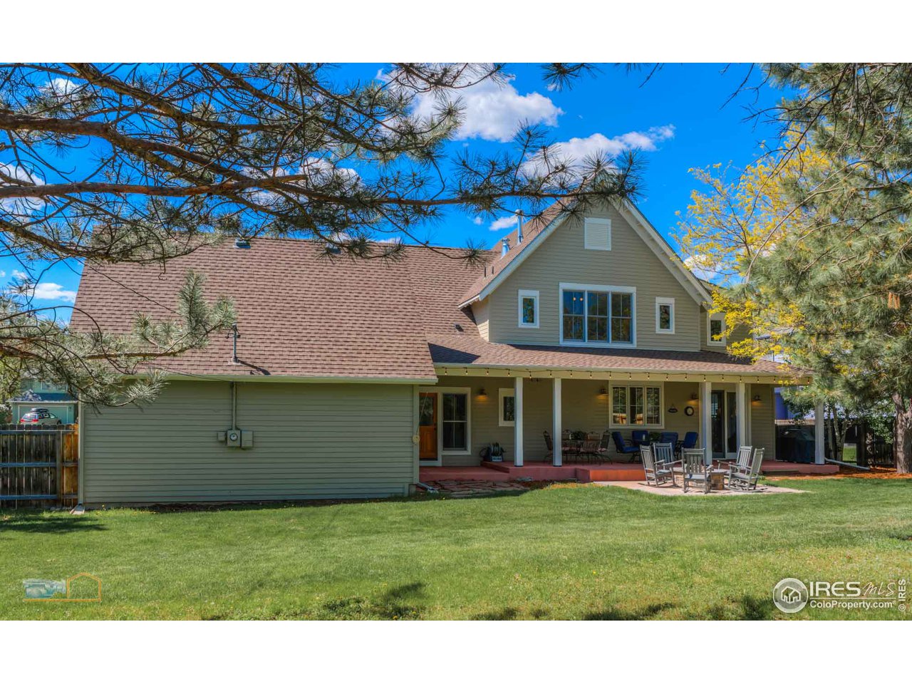 1799 Oak Avenue Boulder, CO 80304 - Photo 26 of 38 a front view of a house with a garden