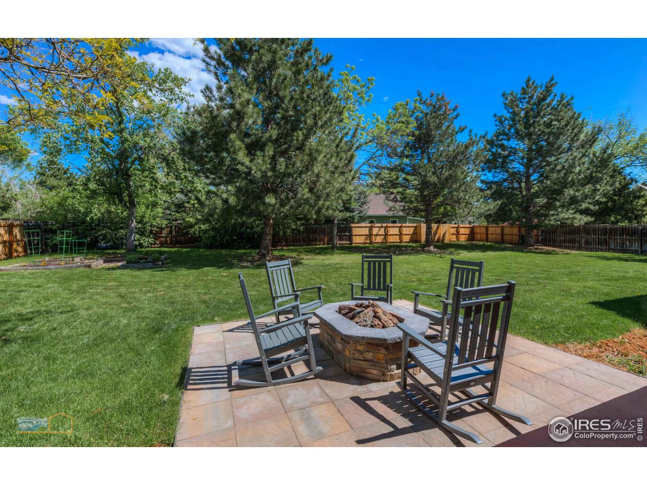 1799 Oak Avenue Boulder, CO 80304 - Photo 33 of 38 a view of a chair and table on the green field