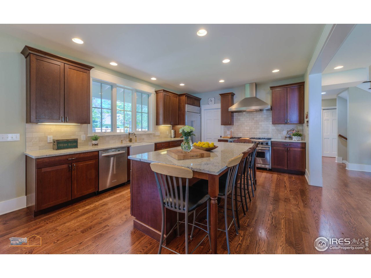 1799 Oak Avenue Boulder, CO 80304 - Photo 5 of 38 a kitchen with a table and chairs in it