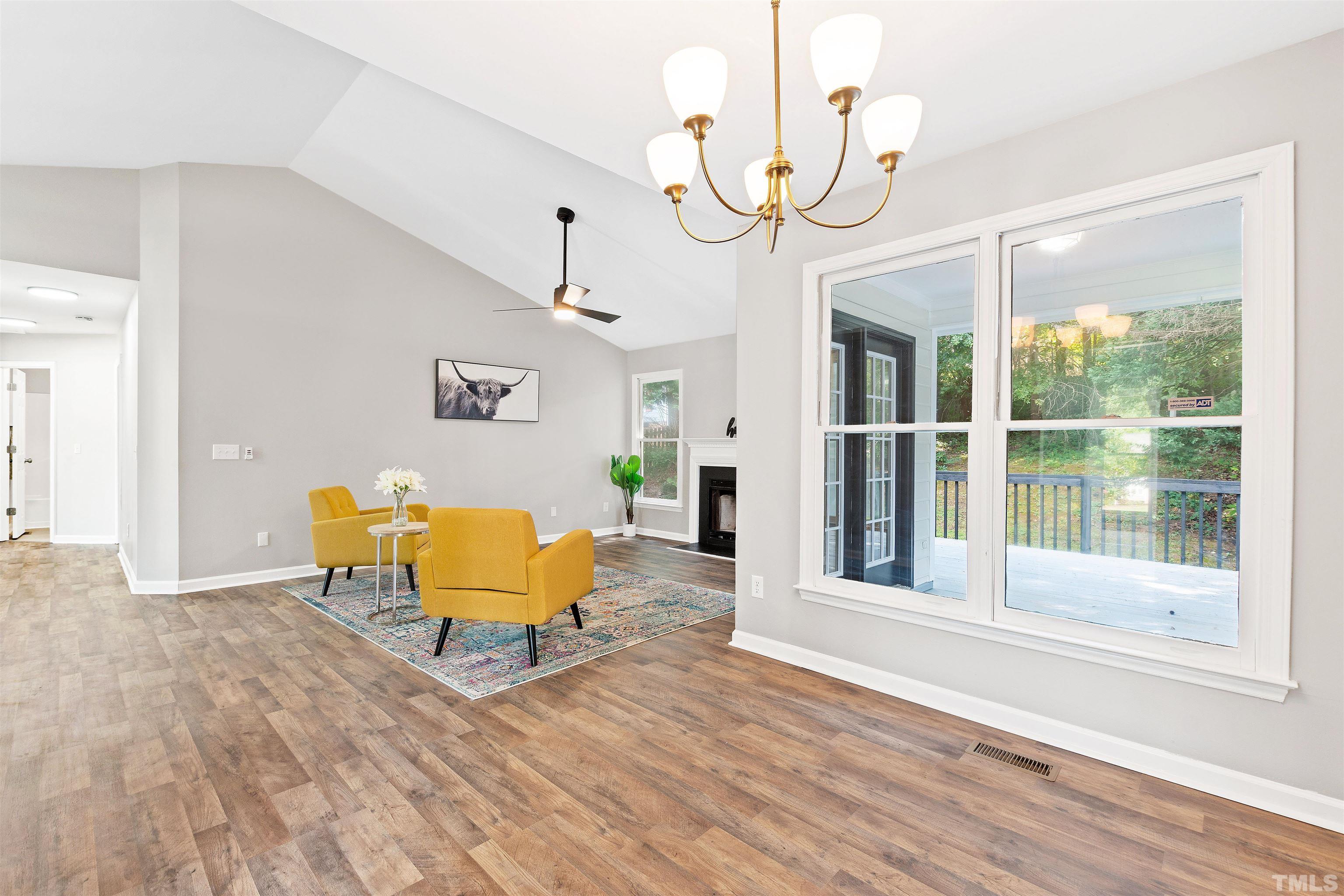 2109 Cardhu Way Raleigh, NC 27603 - Photo 18 of 40 a living room with patio furniture