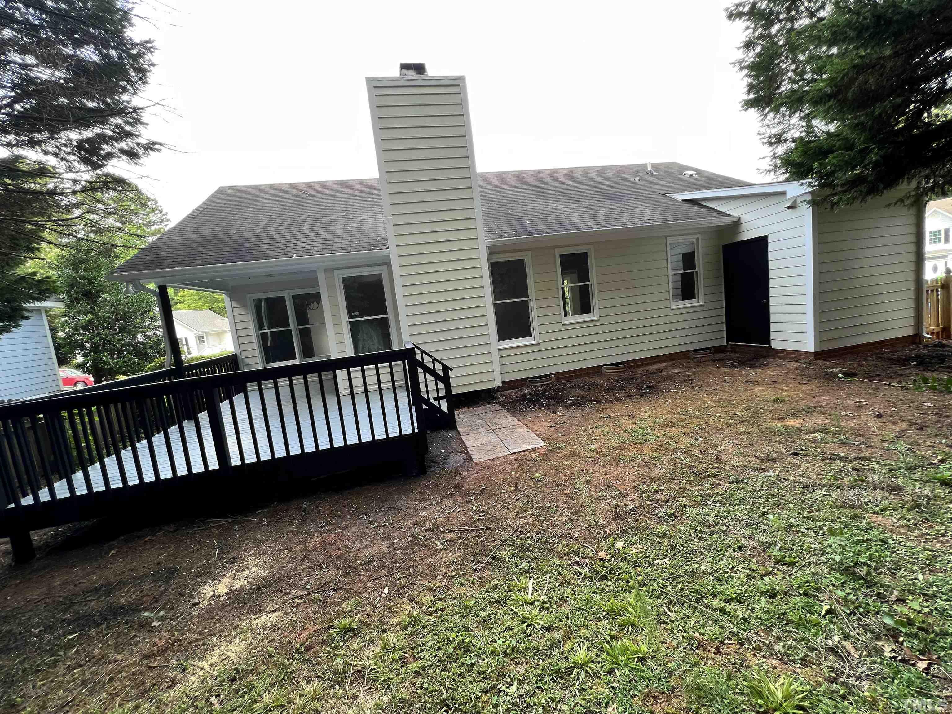 2109 Cardhu Way Raleigh, NC 27603 - Photo 5 of 40 a view of a house with a porch