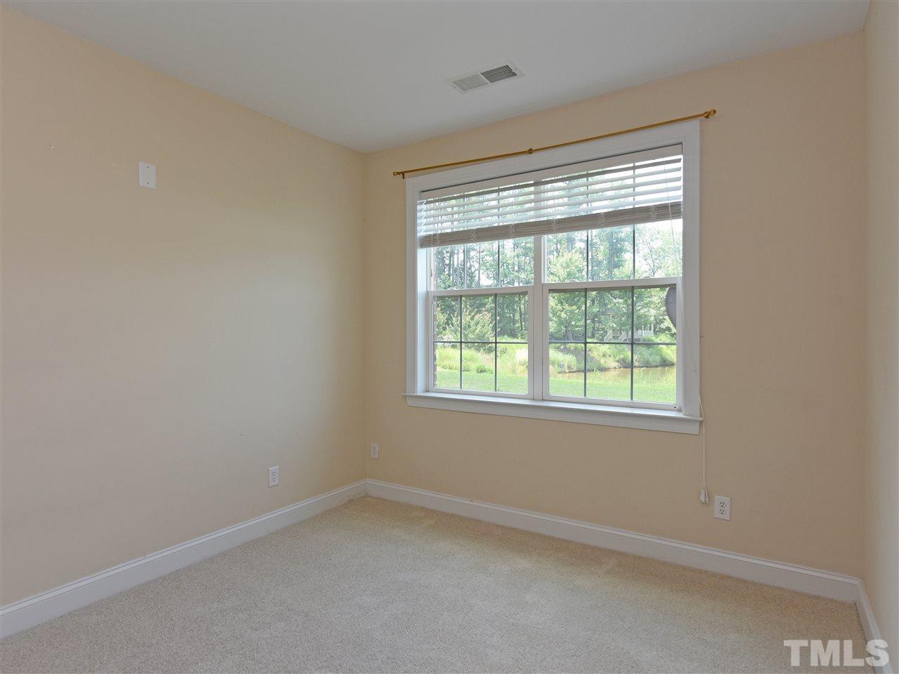 10411 Rosegate Court, Unit 5 Raleigh, NC 27617 - Photo 16 of 24 an empty room with a window