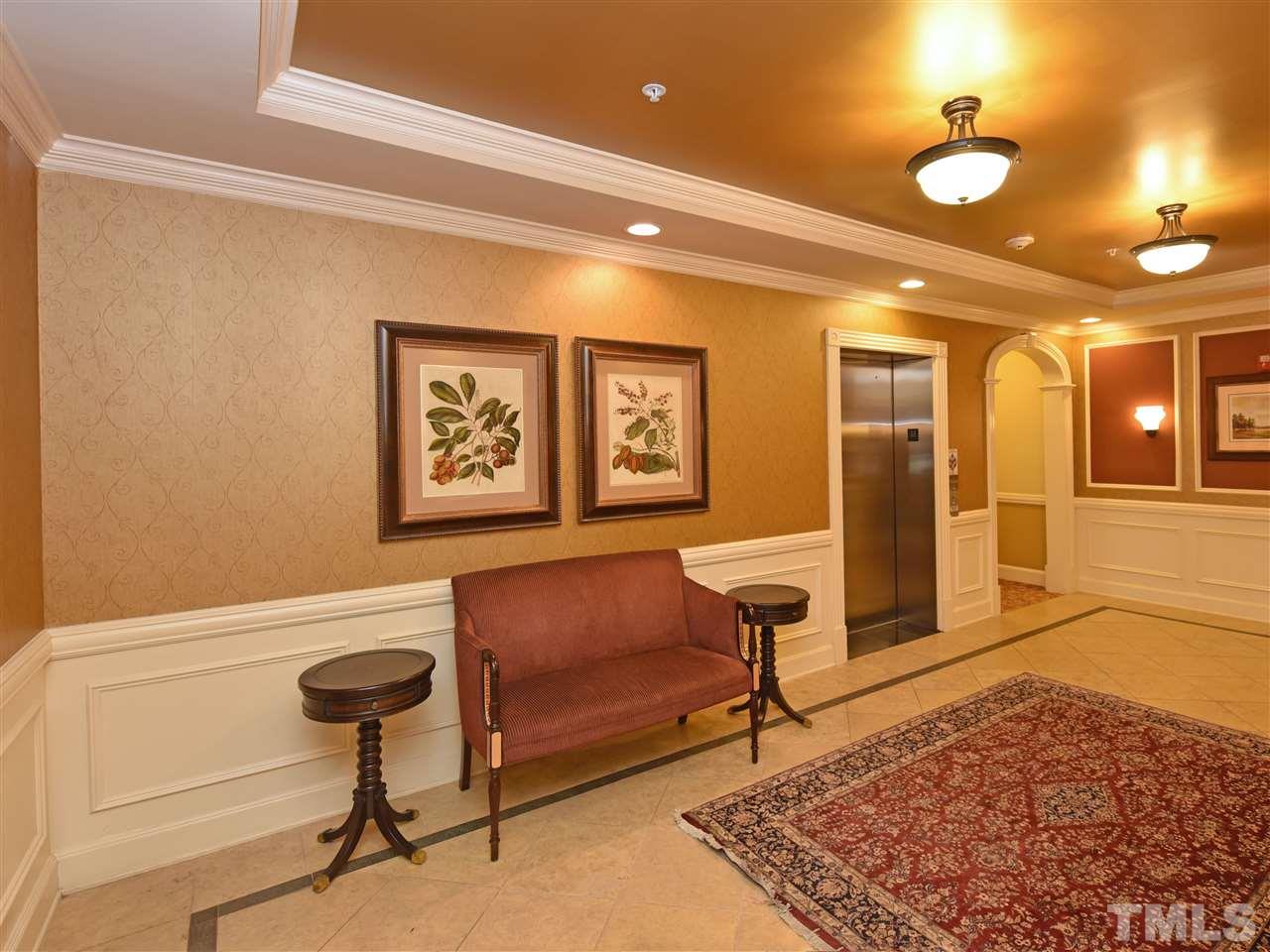 10411 Rosegate Court, Unit 5 Raleigh, NC 27617 - Photo 3 of 24 a living room with furniture and a rug