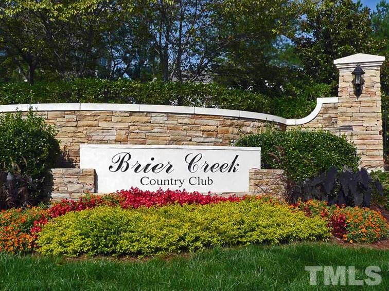 10411 Rosegate Court, Unit 5 Raleigh, NC 27617 - Photo 22 of 24 a sign on the side of the road