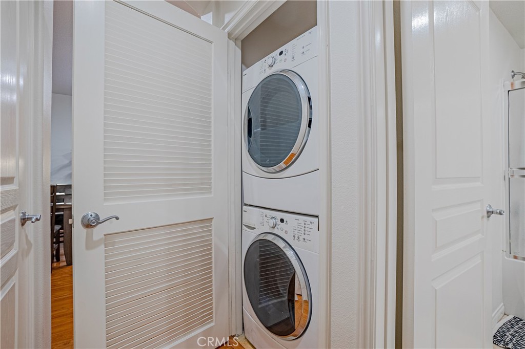 12668 Chapman Avenue, Unit 2108 Garden Grove, CA 92840 - Photo 27 of 40 a utility room with dryer and washer