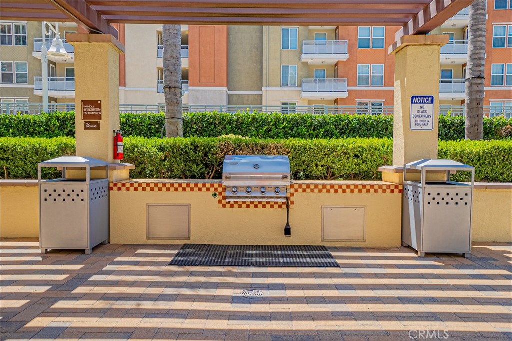 12668 Chapman Avenue, Unit 2108 Garden Grove, CA 92840 - Photo 30 of 40 a view of a building with a street