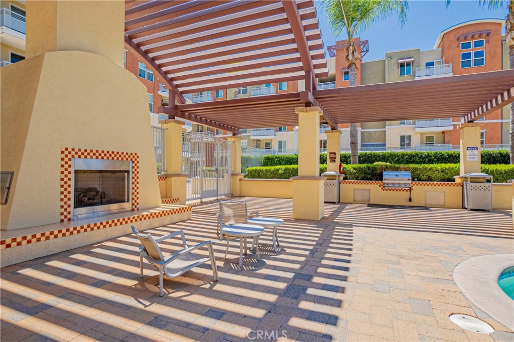 12668 Chapman Avenue, Unit 2108 Garden Grove, CA 92840 - Photo 31 of 40 a view of a building with a street