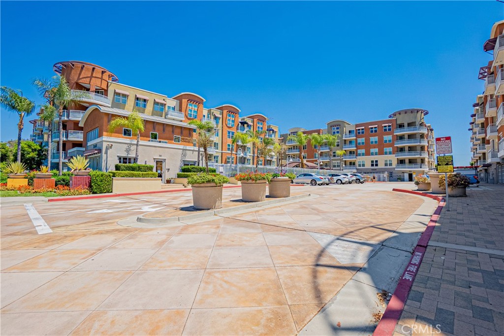 12668 Chapman Avenue, Unit 2108 Garden Grove, CA 92840 - Photo 35 of 40 a view of building with street