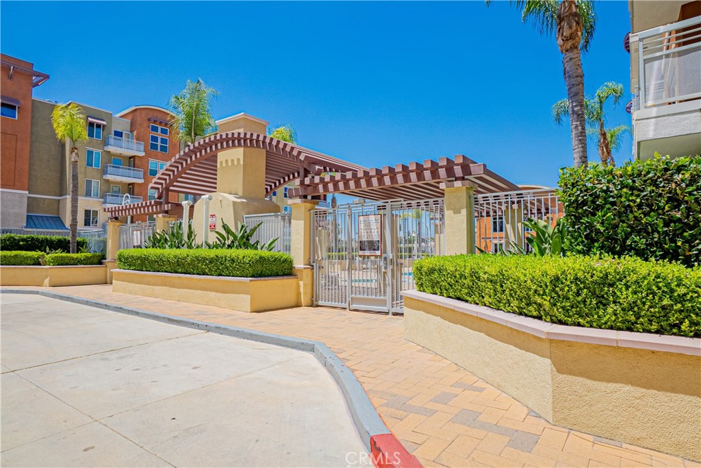 12668 Chapman Avenue, Unit 2108 Garden Grove, CA 92840 - Photo 38 of 40 a view of a building with a street