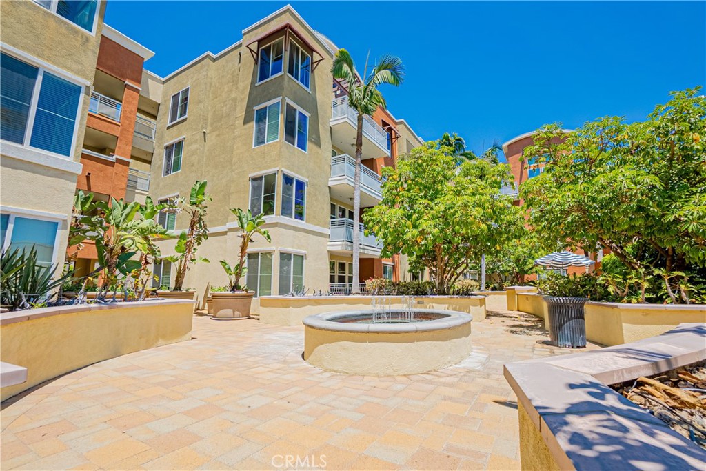 12668 Chapman Avenue, Unit 2108 Garden Grove, CA 92840 - Photo 39 of 40 a building view with outdoor space