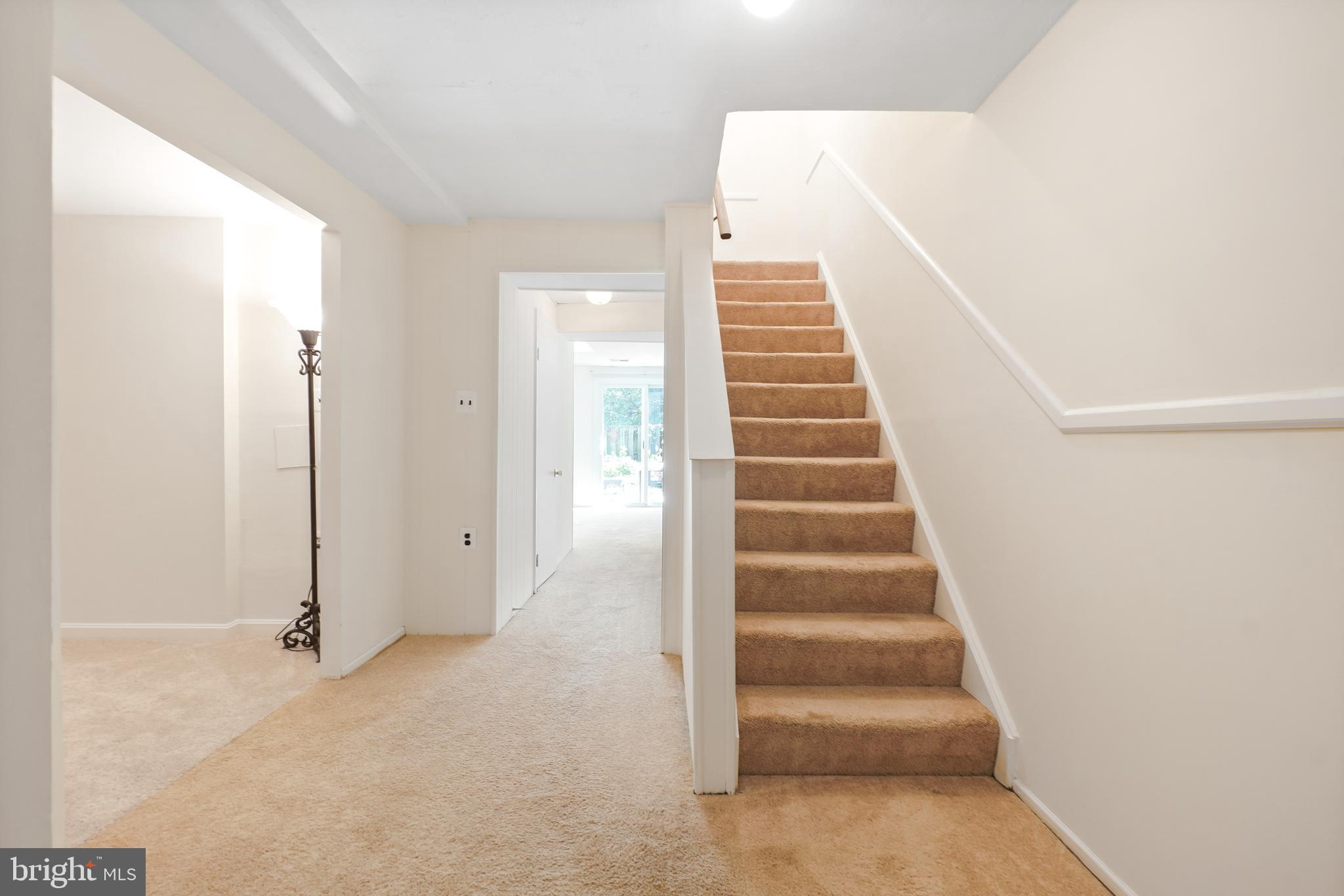 8900 Centerway Road Gaithersburg, MD 20879 - Photo 24 of 32 a view of an entryway with staircase