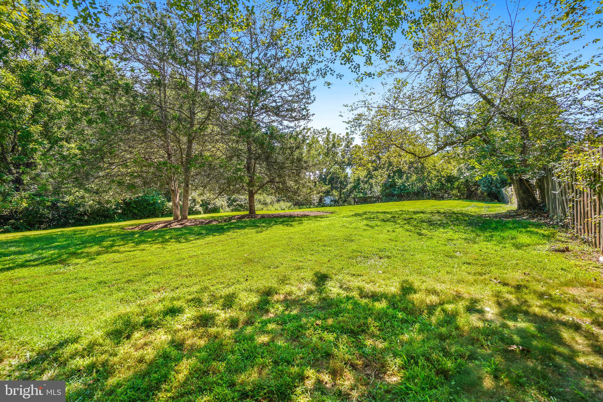 8900 Centerway Road Gaithersburg, MD 20879 - Photo 29 of 32 a view of outdoor space with deck and yard