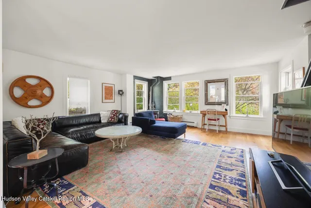 a living room with furniture and a table