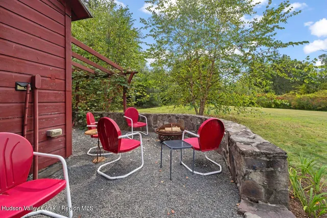 a backyard of a house with seating space