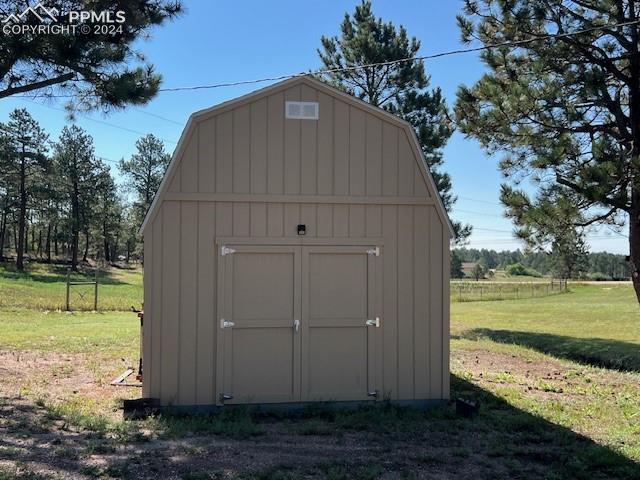 7280 Mathews Road Colorado Springs, CO 80908 - Photo 7 of 31 View of outbuilding featuring a yard