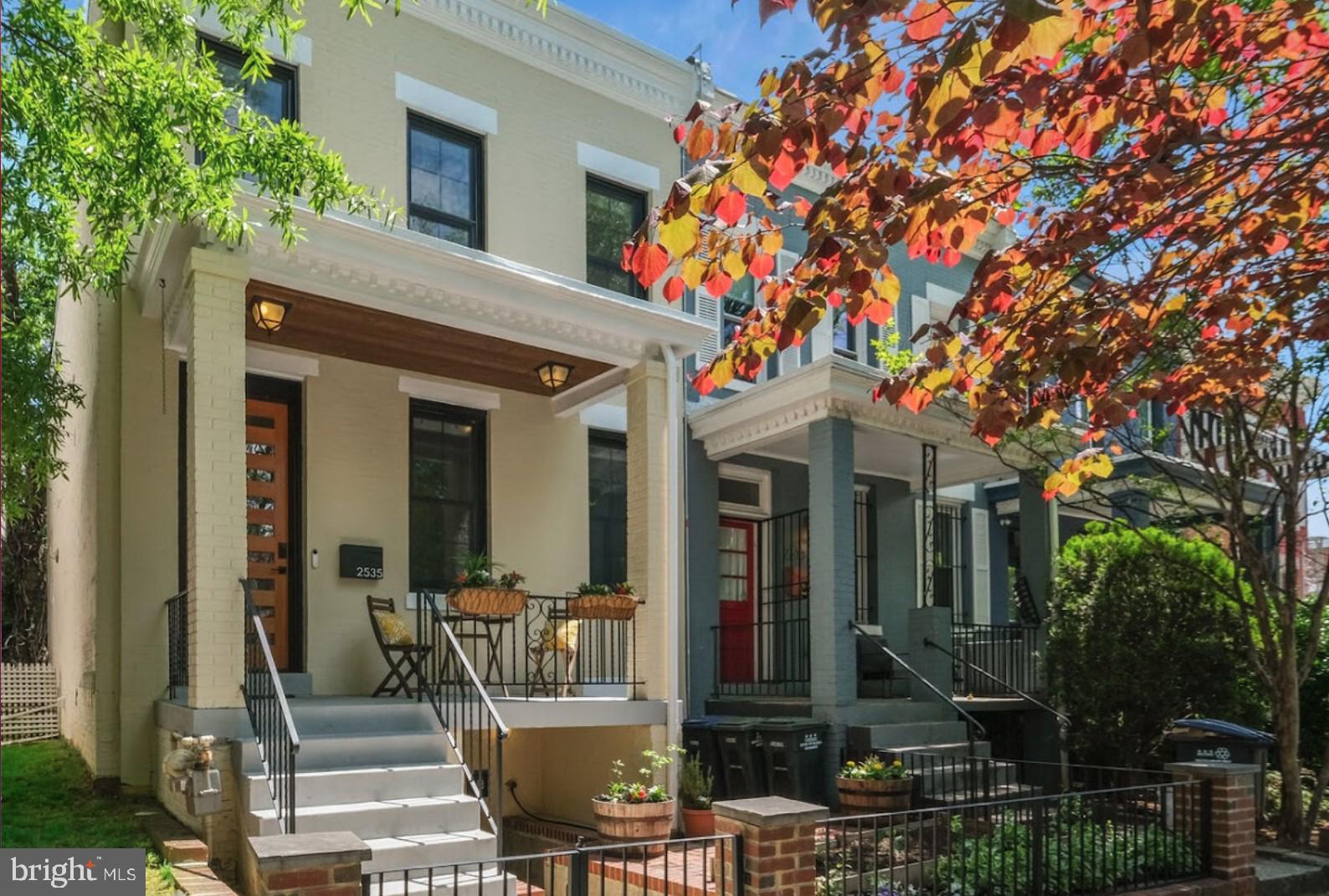 2535 11th Street Northwest Washington, DC 20001 - Photo 1 of 32 a front view of a house with outdoor seating and trees