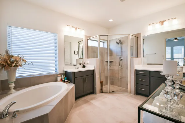 a bathroom with a toilet and a shower curtain