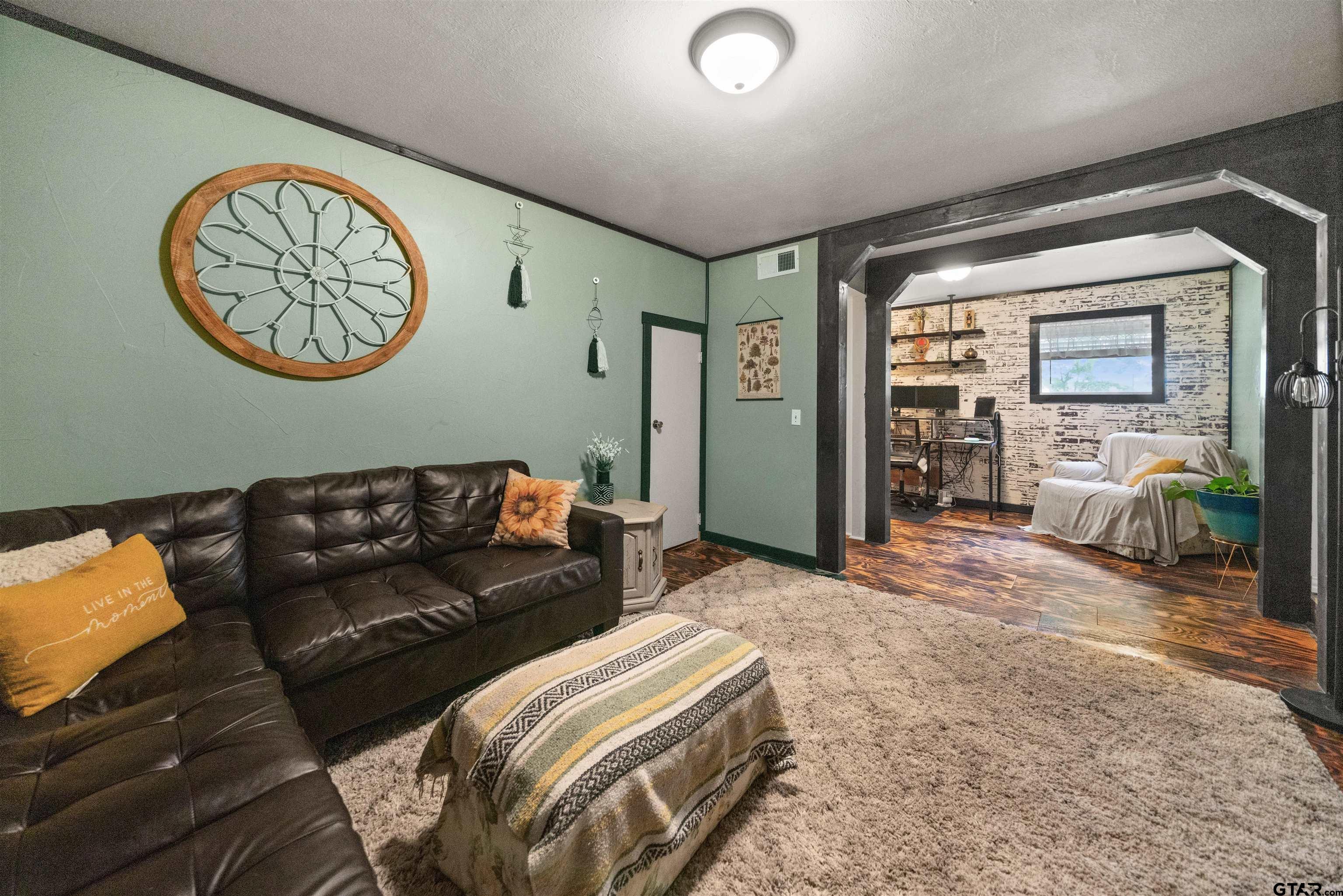 110 Utah Street Van, TX 75790 - Photo 14 of 48 a living room with furniture and a flat screen tv