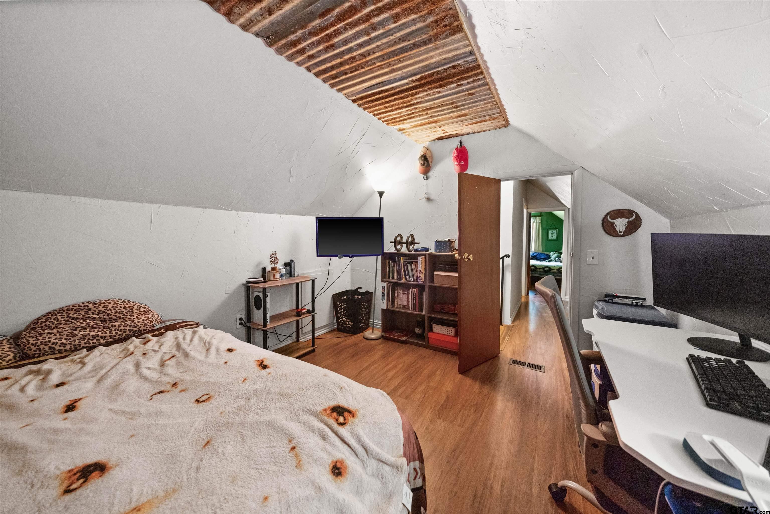 110 Utah Street Van, TX 75790 - Photo 25 of 48 a bed room with a bed and a television