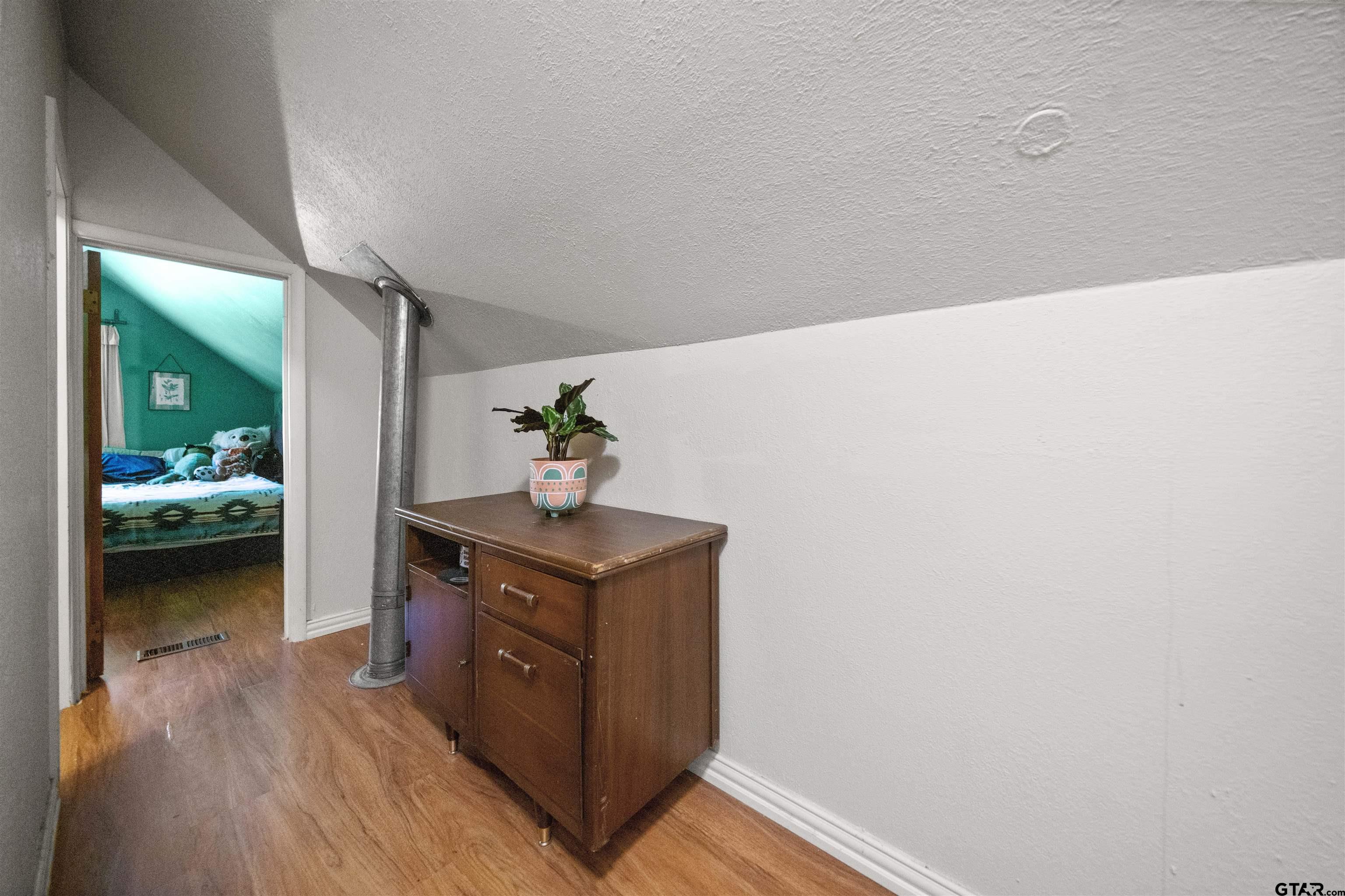 110 Utah Street Van, TX 75790 - Photo 26 of 48 a hallway with a washer and dryer