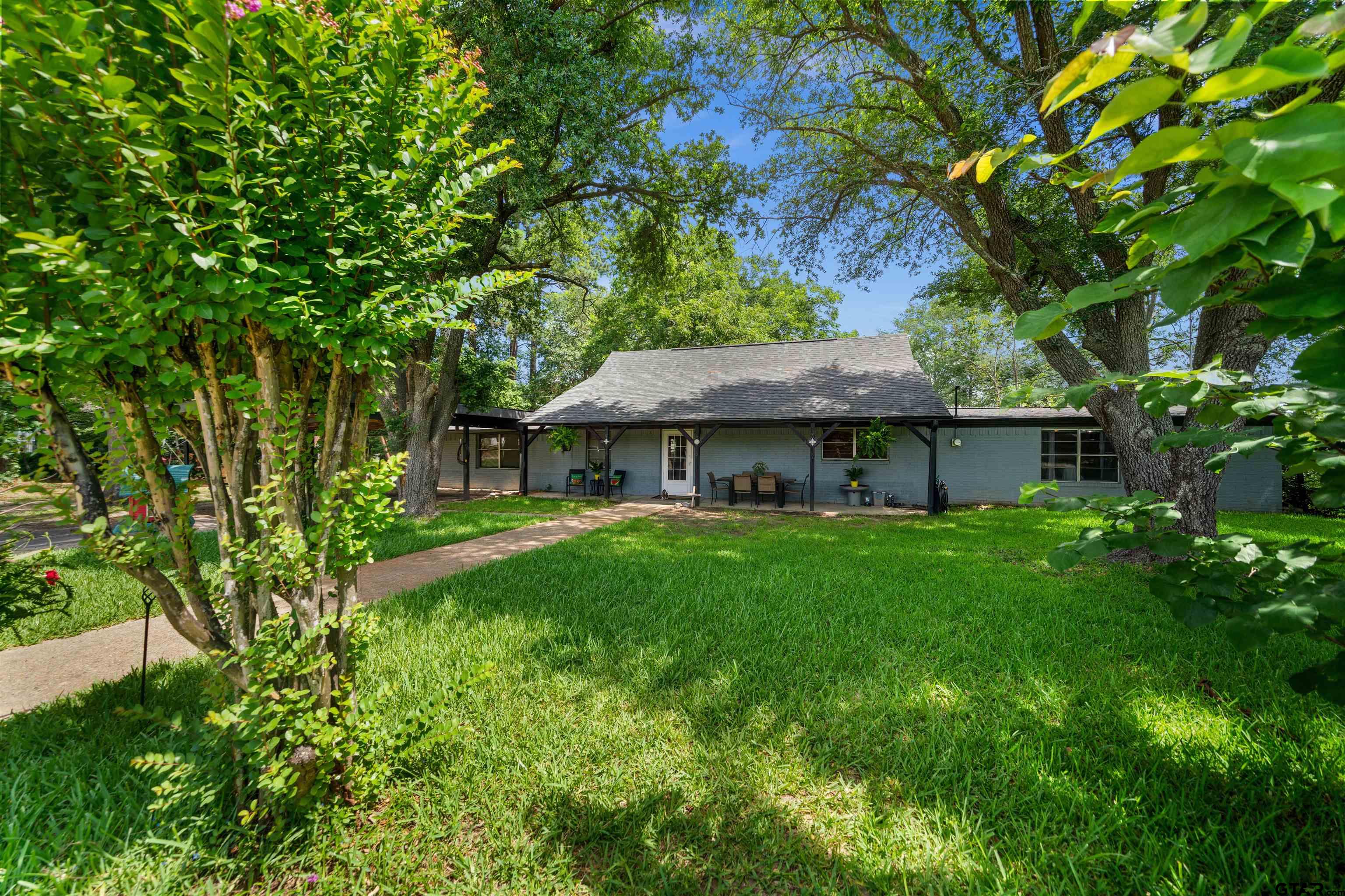 110 Utah Street Van, TX 75790 - Photo 3 of 48 a view of a house with a yard