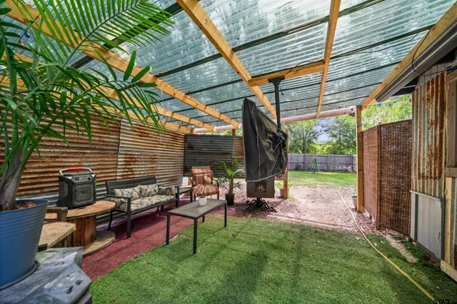 a view of a park with large trees