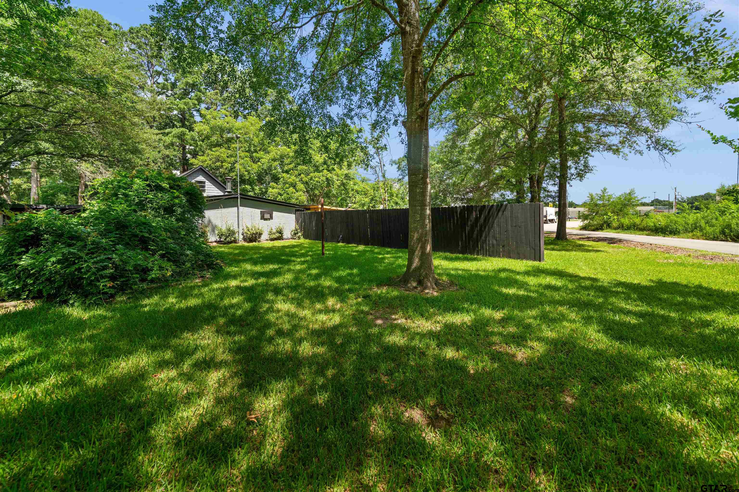 110 Utah Street Van, TX 75790 - Photo 39 of 48 a view of a backyard with a small cabin
