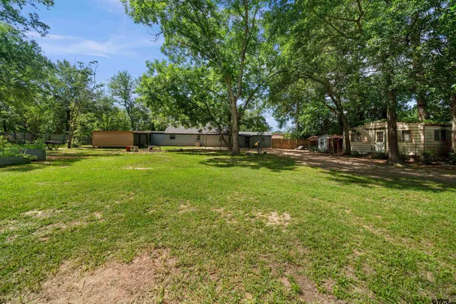 a view of outdoor space and yard