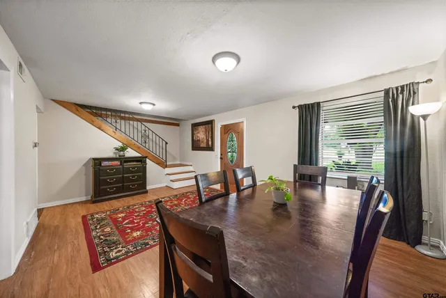 a view of a dining room with furniture