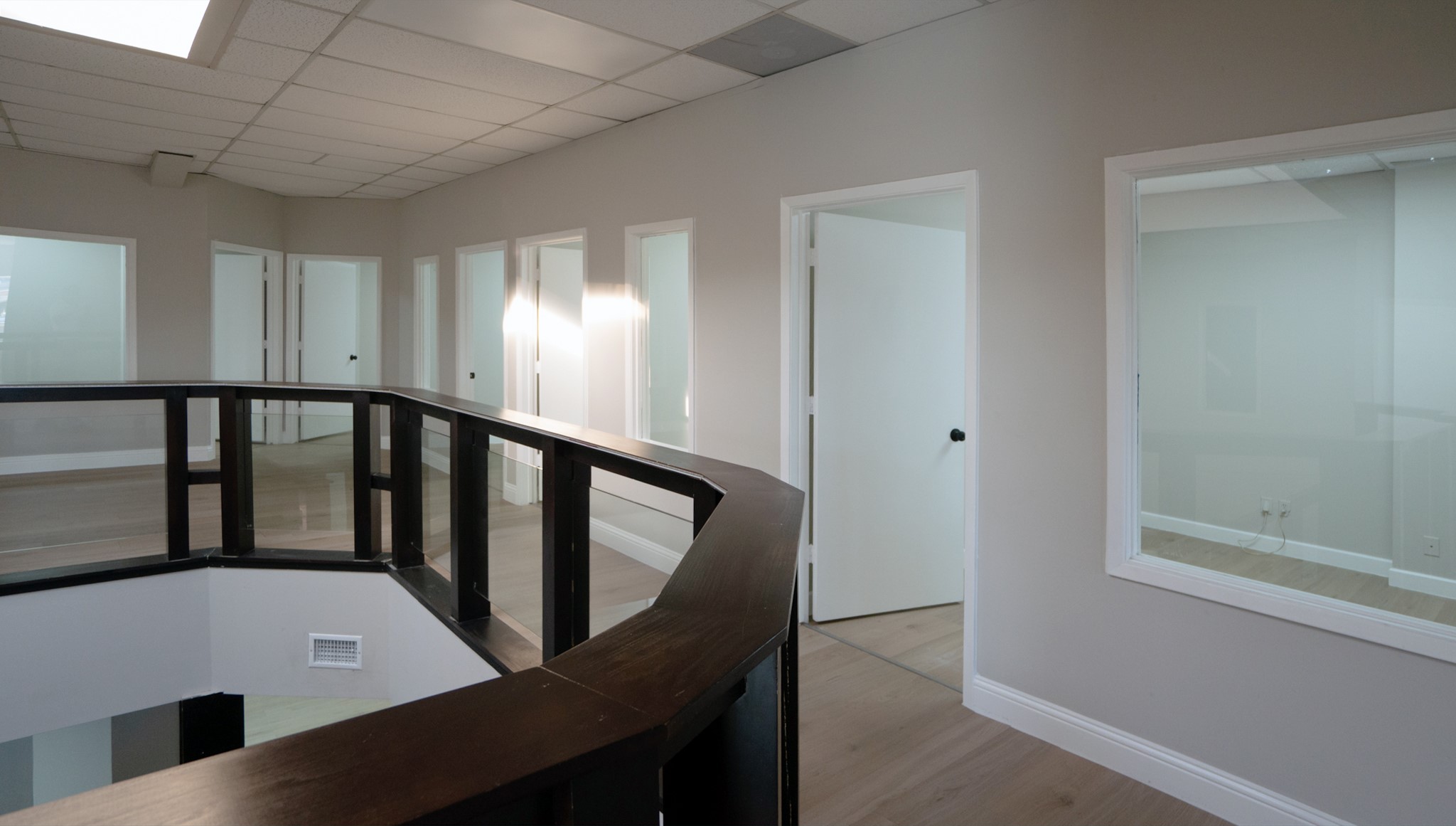 9220 Rasmus Drive Houston, TX 77063 - Photo 11 of 30 a view of a hallway with an empty space