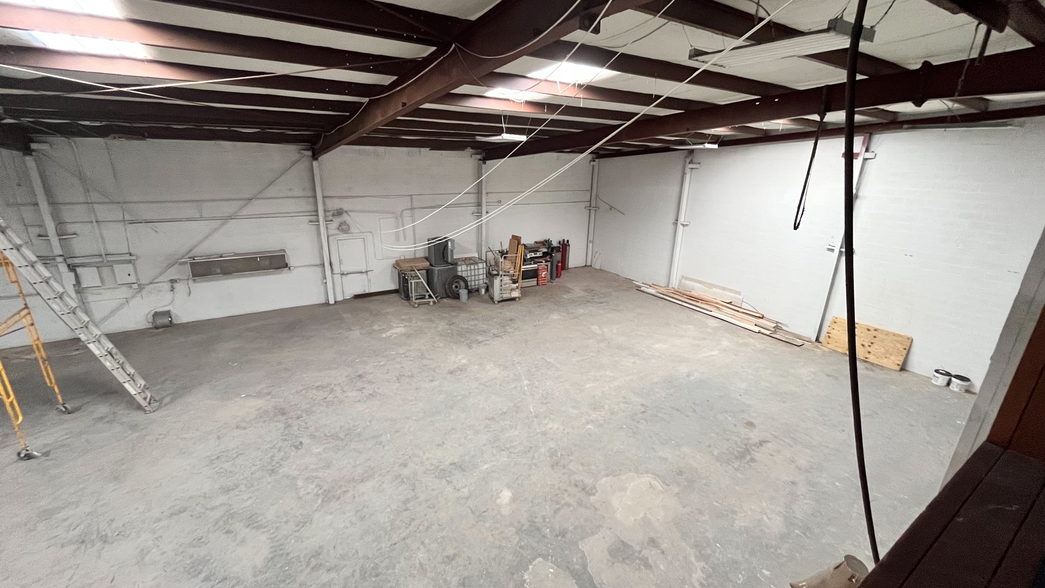 9220 Rasmus Drive Houston, TX 77063 - Photo 27 of 30 a view of empty room with wooden walls