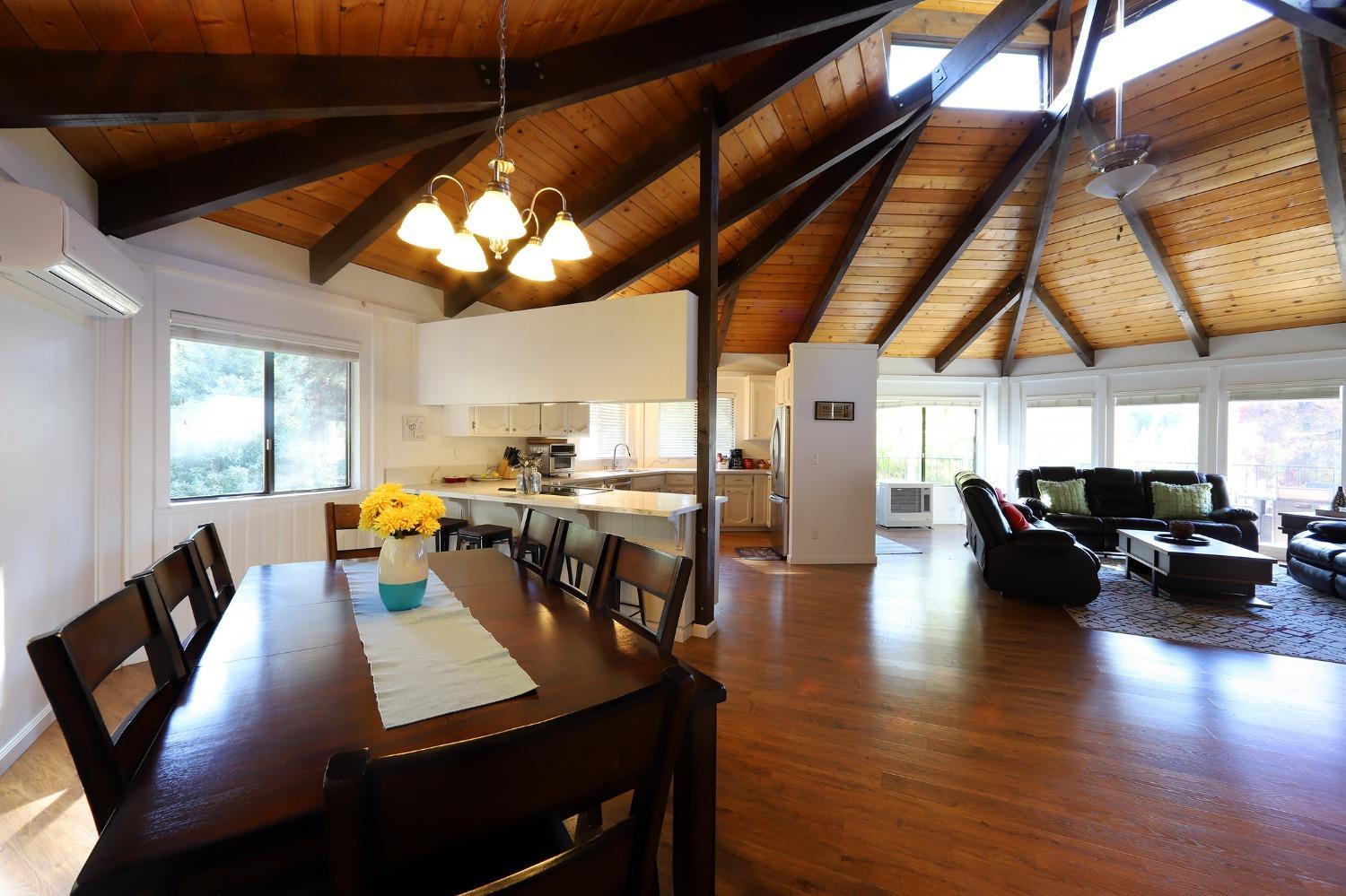 1870 Cable Road Camino, CA 95709 - Photo 30 of 36 a view of a dining room with furniture window and wooden floor