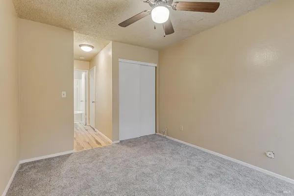 an empty room with a bathroom