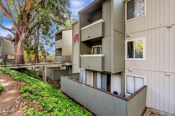 a view of balcony with barbeque and stove