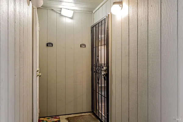 a bathroom with a shower and a mirror
