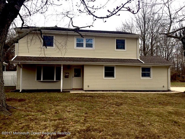 10 Carriage Road North Hazlet, NJ 07730 - Photo 1 of 24 a front view of a house with yard